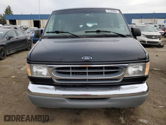 1999 Ford Econoline Cargo with VIN 1FDRE14W6XHA56562, listed as a Copart auction lot 75185804 with 153,673 mi miles and Clean title. Bid and sale history available at DreamBid. Image 5.