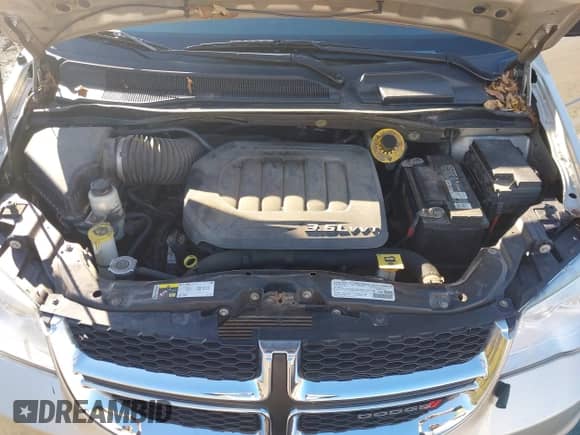 2014 Dodge Grand Caravan SE z VIN 2C4RDGBG2ER106719, wystawiony jako IAAI lot #43560873 z przebiegiem 183 833 mil mil oraz . Historia ofert i sprzedaży dostępna na DreamBid. Obrazek 10.