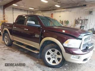 2012 Ram 1500 Laramie Longhorn z VIN 1C6RD7PT9CS174671, wystawiony jako IAAI lot #43391500 z przebiegiem 119 525 mil mil oraz . Historia ofert i sprzedaży dostępna na DreamBid. Obrazek 1.
