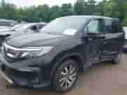 2019 Honda Pilot EX-L z VIN 5FNYF6H51KB061852, wystawiony jako IAAI lot #42501422 z przebiegiem 95 258 mil mil oraz . Historia ofert i sprzedaży dostępna na DreamBid. Obrazek 2.