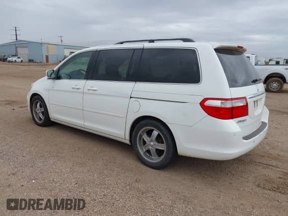 2006 Honda Odyssey Touring z VIN 5FNRL388X6B114012, wystawiony jako IAAI lot #43438223 z przebiegiem 260 977 mil mil oraz . Historia ofert i sprzedaży dostępna na DreamBid. Obrazek 3.