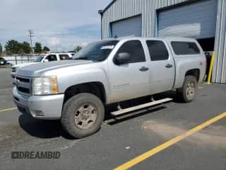 2011 Chevrolet Silverado 1500 LT with VIN 3GCPKSE35BG233202, listed as a Copart auction lot 66222275 with 195,618 mi miles and Salvage title. Bid and sale history available at DreamBid. Image 1.