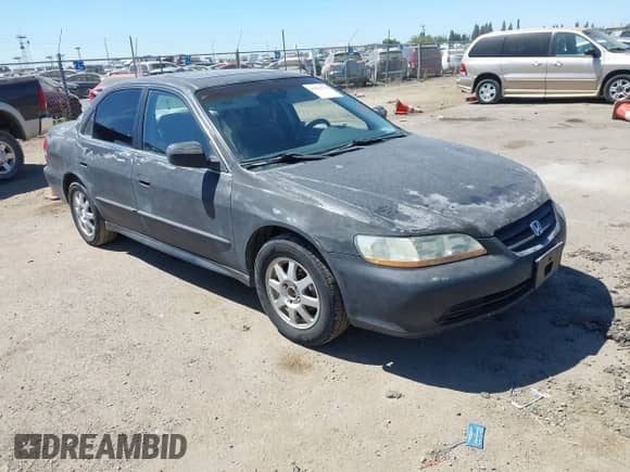 2002 Honda Accord SE with VIN 1HGCG56702A112502, listed as a IAAI auction lot 42930750 with 211,768 mi miles and . Bid and sale history available at DreamBid. Image 1.