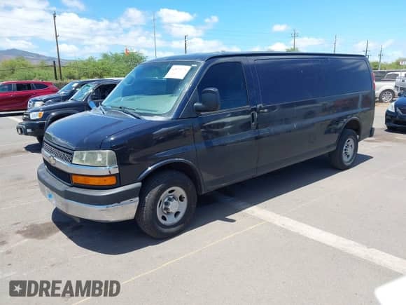 2014 Chevrolet Express Cargo with VIN 1GCWGGFA8E1200169, listed as a IAAI auction lot 42873279 with 95,155 mi miles and . Bid and sale history available at DreamBid. Image 2.