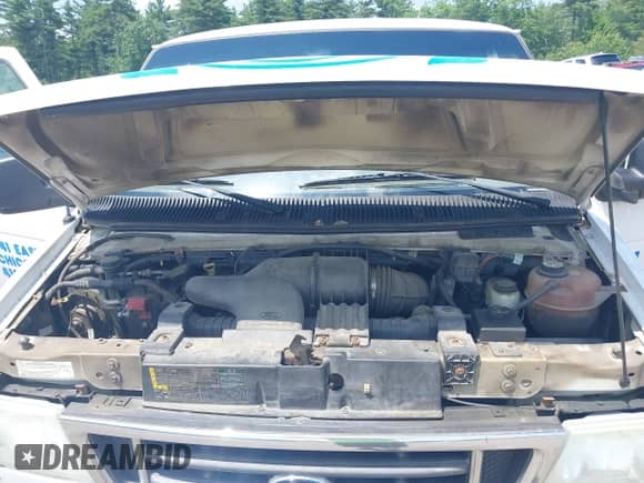 2006 Ford Econoline Cargo with VIN 1FTNE24L16HB43797, listed as a IAAI auction lot 42557448 with 230,514 mi miles and . Bid and sale history available at DreamBid. Image 10.