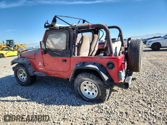 2001 Jeep Wrangler SE with VIN 1J4FA29P31P332021, listed as a Copart auction lot 91076825 with Not provided miles and Clean title. Bid and sale history available at DreamBid. Image 2.