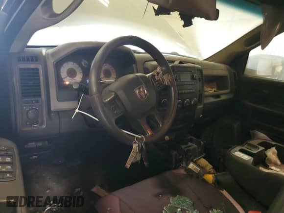 2012 Ram 1500 ST z VIN 1C6RD7FP2CS118348, wystawiony jako Copart lot #68196835 z przebiegiem 192 322 mil mil oraz Czysty tytuł • Clean title. Historia ofert i sprzedaży dostępna na DreamBid. Obrazek 8.