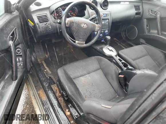 2008 Hyundai Tiburon GS с VIN KMHHM66D18U264820, выставлен на аукционе Copart как лот 54485415 с пробегом 158 129 миль миль и Списание • Salvage title. История ставок и продаж доступна на DreamBid. Изображение 8.