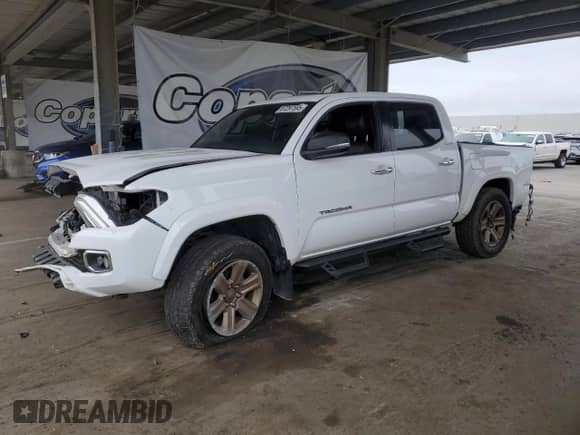 2017 Toyota Tacoma Limited with VIN 3TMGZ5ANXHM119467, listed as a Copart auction lot 87297595 with 236,806 mi miles and Salvage title. Bid and sale history available at DreamBid. Image 1.