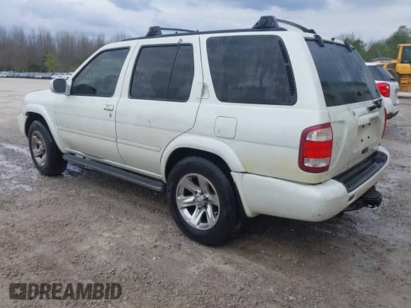 2004 Nissan Pathfinder SE z VIN JN8DR09Y64W905656, wystawiony jako IAAI lot #41507912 z przebiegiem 236 496 mil mil oraz . Historia ofert i sprzedaży dostępna na DreamBid. Obrazek 3.