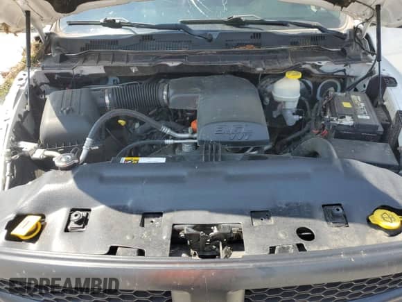 2018 Ram 1500 Tradesman z VIN 1C6RR6KG7JS201465, wystawiony jako Copart lot #63601815 z przebiegiem 139 018 mil mil oraz Szkoda całkowita • Salvage title. Historia ofert i sprzedaży dostępna na DreamBid. Obrazek 11.