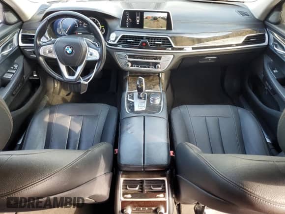 2017 BMW 7 Series 740i xDrive with VIN WBA7E4C59HGU99458, listed as a Copart auction lot 65413575 with 80,859 mi miles and Salvage title. Bid and sale history available at DreamBid. Image 8.