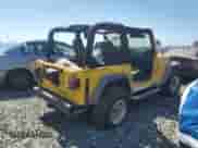 2004 Jeep Wrangler X with VIN 1J4FA39S54P746125, listed as a Copart auction lot 82713424 with 173,856 mi miles and Salvage title. Bid and sale history available at DreamBid. Image 3.