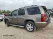 2013 Chevrolet Tahoe LS z VIN 1GNSCAE03DR220272, wystawiony jako Copart lot #89700175 z przebiegiem 144 900 mil mil oraz Szkoda całkowita • Salvage title. Historia ofert i sprzedaży dostępna na DreamBid. Obrazek 2.