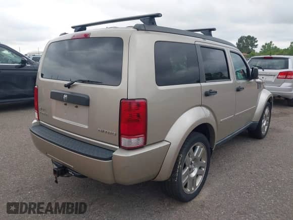 2010 Dodge Nitro Heat with VIN 1D4PT4GK7AW156722, listed as a IAAI auction lot 42508953 with 283,690 mi miles and . Bid and sale history available at DreamBid. Image 4.