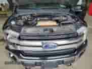 2018 Ford F-150 Lariat with VIN 1FTEW1E55JFC64487, listed as a Copart auction lot 71464255 with 105,578 mi miles and Salvage title. Bid and sale history available at DreamBid. Image 11.