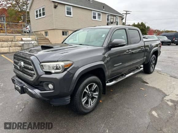 2017 Toyota Tacoma TRD Off Road z VIN 3TMDZ5BNXHM023386, wystawiony jako Copart lot #90888765 z przebiegiem 193 045 mil mil oraz Czysty tytuł • Clean title. Historia ofert i sprzedaży dostępna na DreamBid. Obrazek 1.