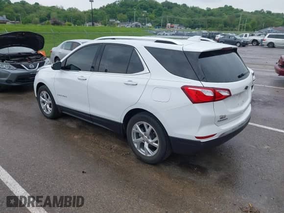 2021 Chevrolet Equinox Premier with VIN 3GNAXNEV5MS160043, listed as a IAAI auction lot 42109564 with 36,808 mi miles and . Bid and sale history available at DreamBid. Image 3.