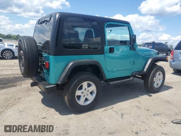 2002 Jeep Wrangler X z VIN 1J4FA39SX2P731469, wystawiony jako Copart lot #71106525 z przebiegiem 199 317 mil mil oraz Czysty tytuł • Clean title. Historia ofert i sprzedaży dostępna na DreamBid. Obrazek 3.