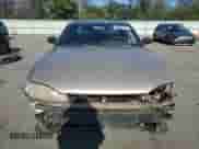1996 Toyota Camry DX z VIN 4T1BG12K1TU751173, wystawiony jako Copart lot #69909135 z przebiegiem 134 247 mil mil oraz Szkoda całkowita • Salvage title. Historia ofert i sprzedaży dostępna na DreamBid. Obrazek 5.