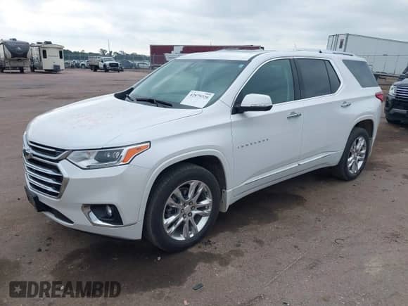 2021 Chevrolet Traverse High Country z VIN 1GNEVNKW6MJ136436, wystawiony jako IAAI lot #42879320 z przebiegiem 71 677 mil mil oraz . Historia ofert i sprzedaży dostępna na DreamBid. Obrazek 2.