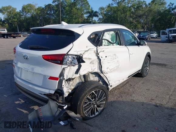 2019 Hyundai Tucson SEL z VIN KM8J33AL4KU991829, wystawiony jako IAAI lot #42002700 z przebiegiem 14 184 mil mil oraz . Historia ofert i sprzedaży dostępna na DreamBid. Obrazek 4.