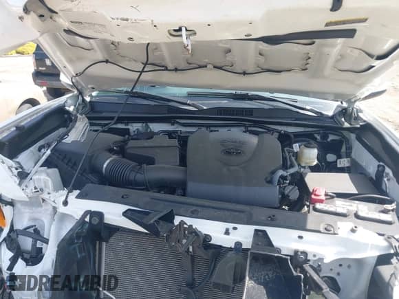 2021 Toyota Tacoma SR5 z VIN 3TMDZ5BN4MM118505, wystawiony jako IAAI lot #41920089 z przebiegiem 30 693 mil mil oraz . Historia ofert i sprzedaży dostępna na DreamBid. Obrazek 10.