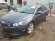 2014 Chevrolet Cruze Diesel with VIN 1G1P75SZ9E7100432, listed as a IAAI auction lot 43155912 with 204,206 mi miles and . Bid and sale history available at DreamBid. Image 2.