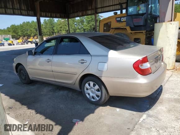 2003 Toyota Camry XLE with VIN 4T1BE32K23U765679, listed as a Copart auction lot 61942494 with Not provided miles and Salvage title. Bid and sale history available at DreamBid. Image 2.