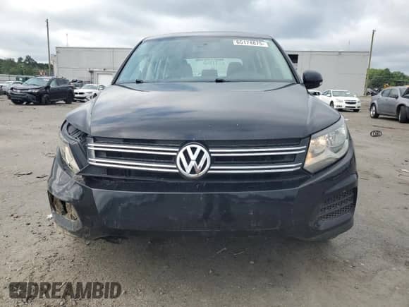 2013 Volkswagen Tiguan SE z VIN WVGAV3AX9DW600422, wystawiony jako Copart lot #64600645 z przebiegiem 134 869 mil mil oraz Czysty tytuł • Clean title. Historia ofert i sprzedaży dostępna na DreamBid. Obrazek 5.