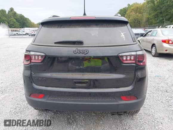 2021 Jeep Compass Altitude with VIN 3C4NJDBBXMT541493, listed as a IAAI auction lot 43287636 with 77,035 mi miles and . Bid and sale history available at DreamBid. Image 16.