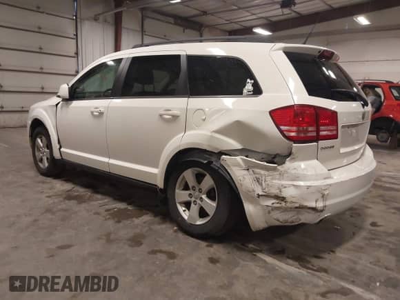 2010 Dodge Journey SXT with VIN 3D4PG5FV2AT148748, listed as a IAAI auction lot 43372254 with 143,735 mi miles and . Bid and sale history available at DreamBid. Image 3.