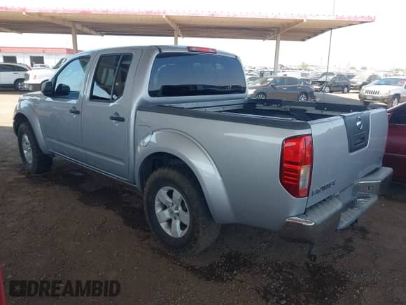 2009 Nissan Frontier SE z VIN 1N6AD07U59C405247, wystawiony jako IAAI lot #42821636 z przebiegiem 164 946 mil mil oraz . Historia ofert i sprzedaży dostępna na DreamBid. Obrazek 3.