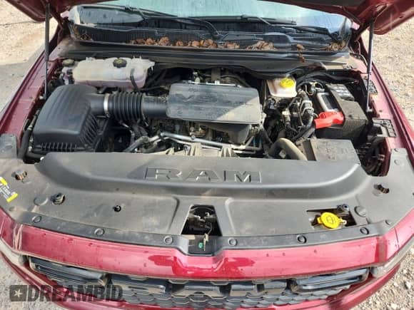 2025 Ram 1500 Tradesman with VIN 1C6RRFGG7SN606380, listed as a Copart auction lot 64974215 with 15,603 mi miles and Salvage title. Bid and sale history available at DreamBid. Image 11.