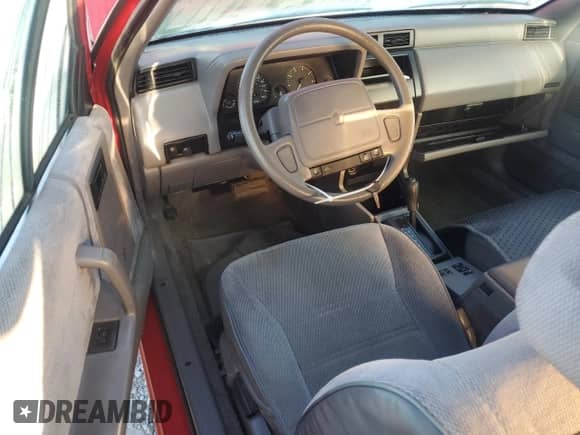 1991 Dodge Shadow with VIN 3B3XP45K6MT551958, listed as a Copart auction lot 73353914 with 116,984 mi miles and Salvage title. Bid and sale history available at DreamBid. Image 8.