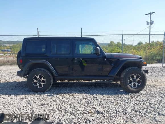 2021 Jeep Wrangler Unlimited Rubicon with VIN 1C4HJXFN5MW550311, listed as a IAAI auction lot 43233853 with 73,508 mi miles and . Bid and sale history available at DreamBid. Image 14.