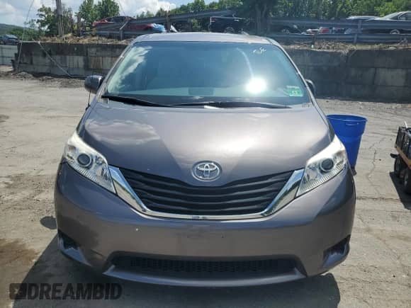 2014 Toyota Sienna LE with VIN 5TDJK3DCXES089309, listed as a Copart auction lot 65089035 with 127,798 mi miles and Salvage title. Bid and sale history available at DreamBid. Image 5.