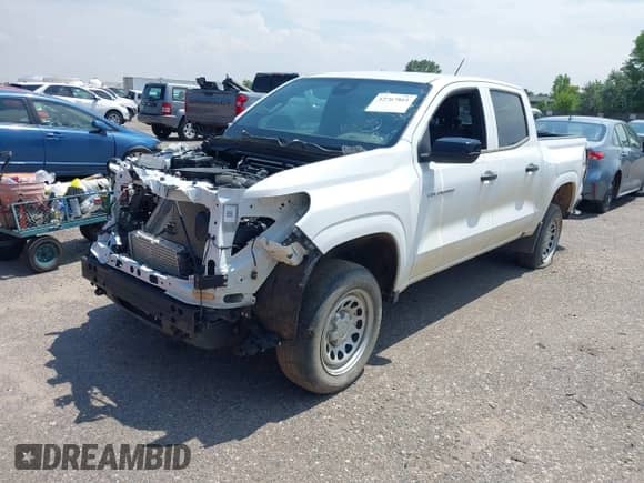 2023 Chevrolet Colorado 4WD Work Truck z VIN 1GCPTBEKXP1211738, wystawiony jako IAAI lot #42767861 z przebiegiem Nie podano mil oraz . Historia ofert i sprzedaży dostępna na DreamBid. Obrazek 17.