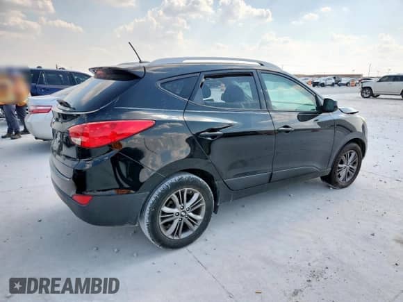 2014 Hyundai Tucson Limited with VIN KM8JU3AG8EU939334, listed as a Copart auction lot 69634955 with 128,580 mi miles and Salvage title. Bid and sale history available at DreamBid. Image 3.