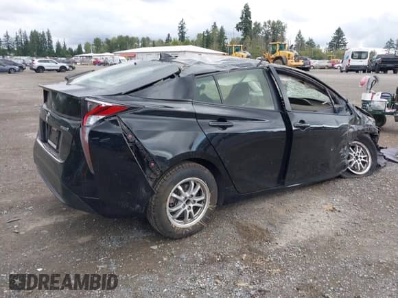 2016 Toyota Prius Two with VIN JTDKBRFU8G3011001, listed as a IAAI auction lot 42910688 with 129,322 mi miles and . Bid and sale history available at DreamBid. Image 4.