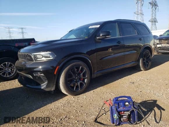 2023 Dodge Durango R/T Plus with VIN 1C4SDJCT2PC584757, listed as a Copart auction lot 68424405 with 74,835 mi miles and Salvage title. Bid and sale history available at DreamBid. Image 1.