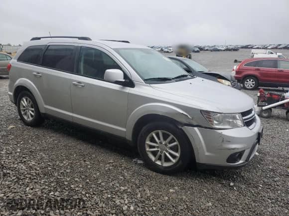 2014 Dodge Journey SXT with VIN 3C4PDCBB8ET180650, listed as a Copart auction lot 85146925 with 181,951 mi miles and Salvage title. Bid and sale history available at DreamBid. Image 4.