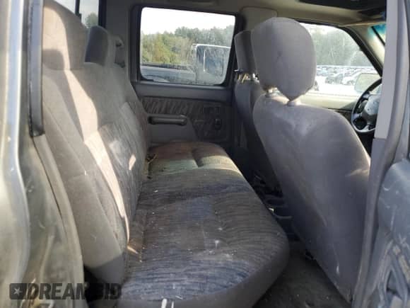 2000 Nissan Frontier XE с VIN 1N6ED27Y2YC388499, выставлен на аукционе Copart как лот 81009055 с пробегом Не указан миль и Списание • Salvage title. История ставок и продаж доступна на DreamBid. Изображение 10.