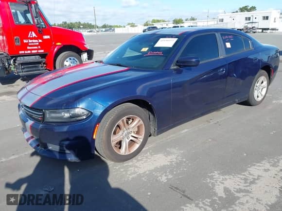 2017 Dodge Charger SE with VIN 2C3CDXBG8HH532452, listed as a IAAI auction lot 43339277 with 202,379 mi miles and . Bid and sale history available at DreamBid. Image 2.