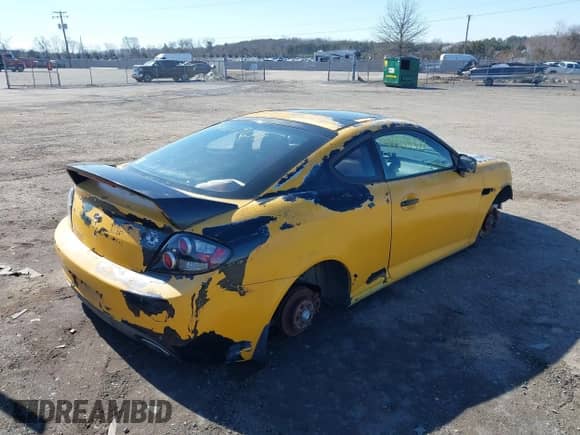 2007 Hyundai Tiburon GT с VIN KMHHN66FX7U258298, выставлен на аукционе IAAI как лот 41619641 с пробегом 146 587 миль миль и . История ставок и продаж доступна на DreamBid. Изображение 4.