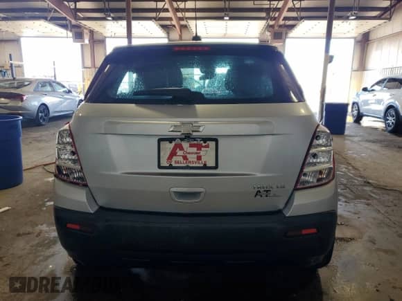 2016 Chevrolet Trax LS z VIN KL7CJKSB6GB558788, wystawiony jako Copart lot #85329875 z przebiegiem Nie podano mil oraz Szkoda całkowita • Salvage title. Historia ofert i sprzedaży dostępna na DreamBid. Obrazek 6.