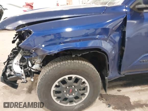 2024 Toyota Tacoma SR5 with VIN 3TMLB5JN3RM054207, listed as a IAAI auction lot 41171946 with 3,808 mi miles and . Bid and sale history available at DreamBid. Image 17.