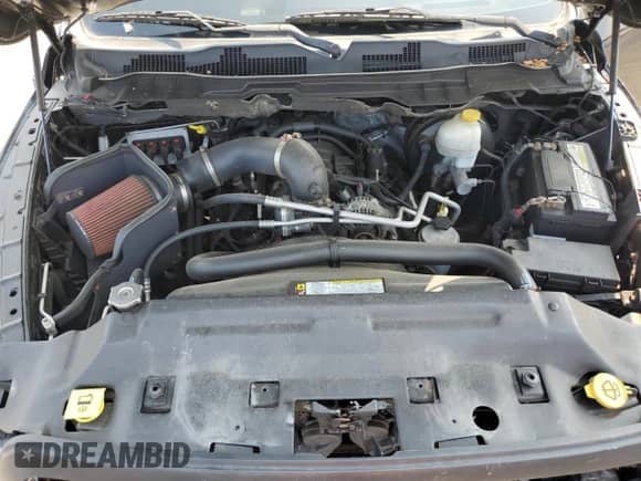 2012 Ram 1500 Sport with VIN 1C6RD7HTXCS121461, listed as a Copart auction lot 66810405 with 104,928 mi miles and Salvage title. Bid and sale history available at DreamBid. Image 11.