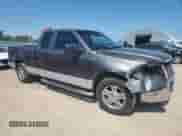 2007 Ford F-150 XL with VIN 1FTPX12V67KB02975, listed as a Copart auction lot 80307185 with 129,442 mi miles and Salvage title. Bid and sale history available at DreamBid. Image 4.