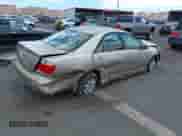 2005 Toyota Camry LE with VIN JTDBF30K150158395, listed as a IAAI auction lot 42998789 with Not provided miles and . Bid and sale history available at DreamBid. Image 4.